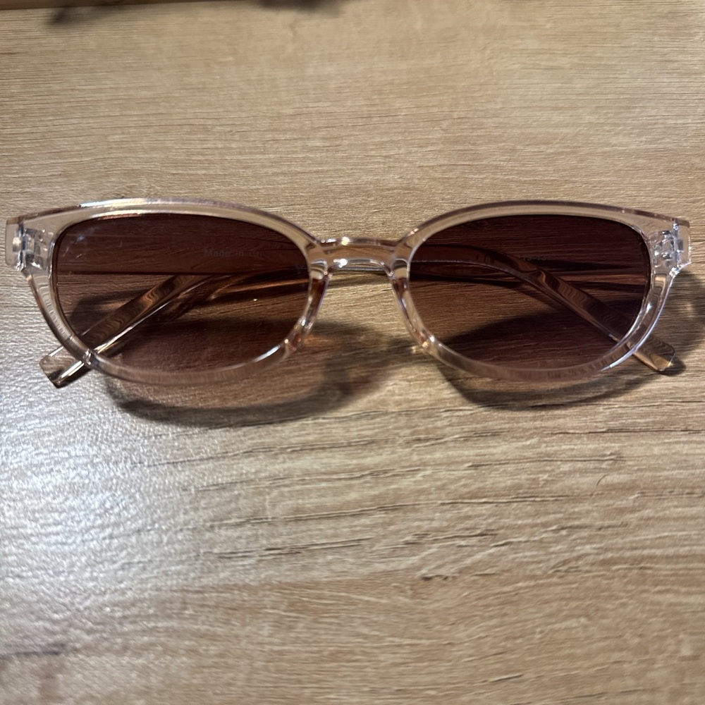 NWOT NYU NYU brown clear sunglasses

has pink tones in sunlight